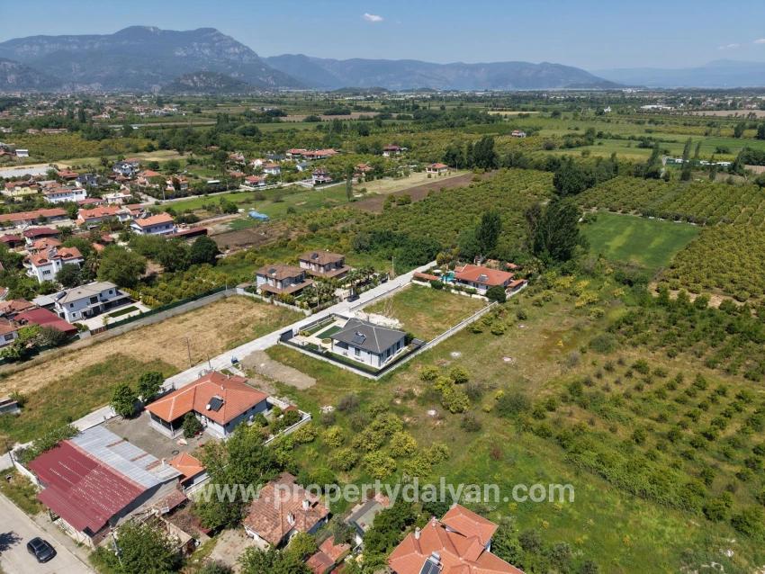 Land For Sale In Okçular, 1050m2, In The Village Residential Area.