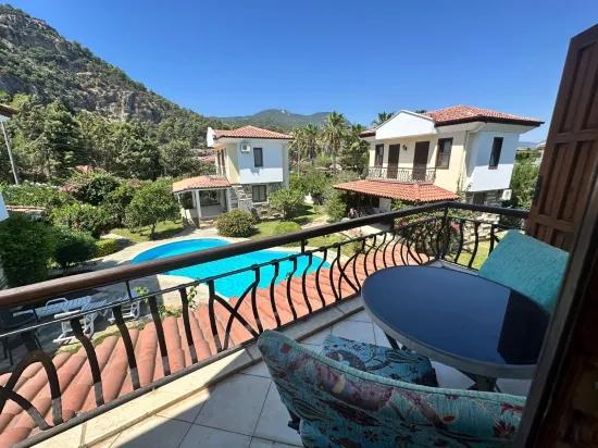 Dalyan Gülpınar'da Site Içerisinde 2+1 Satılık Villa Translates To Dalyan Gülpınar In The Site 2+1 For Sale Villa, However Following The Rules: In Gülpınar, Dalyan, Within The Site 2+1 Villa For Sale