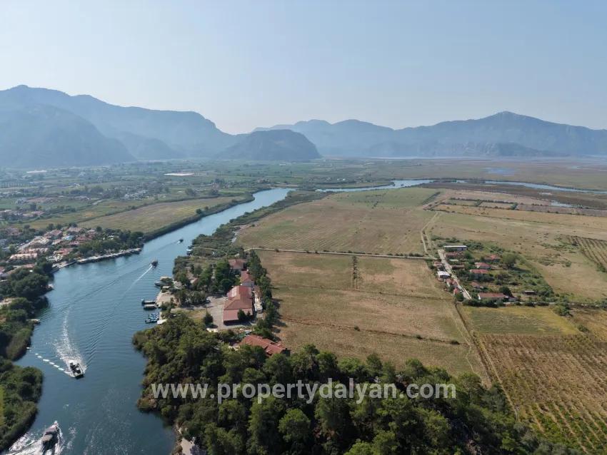 Село Köyceğiz в районе Çandır, у канала, 20.000м2 продажа поля