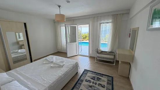 Dalyan Gökbel'de göl ve deniz manzaralı 4+1 satılık villa